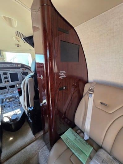 Private jet cabin interior showing luxury seating and in-flight comfort